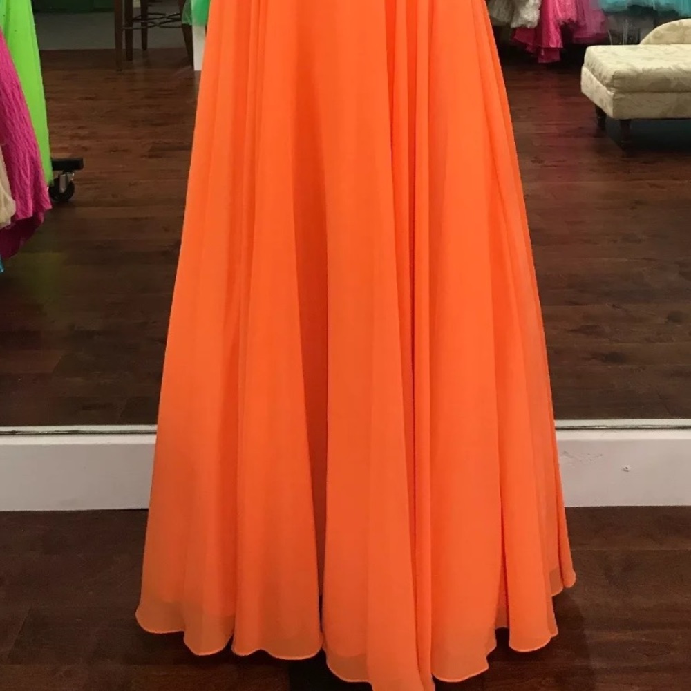 NWT prom or pageant dress.Beautiful orange color